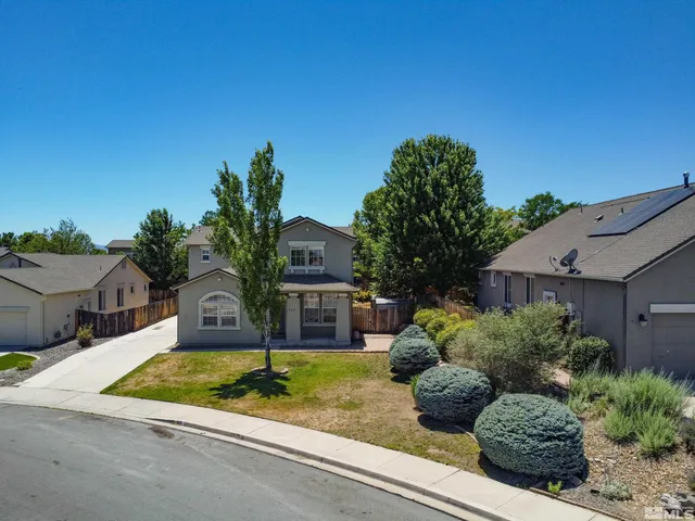 a house view with a outdoor space