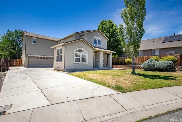a house view with a outdoor space