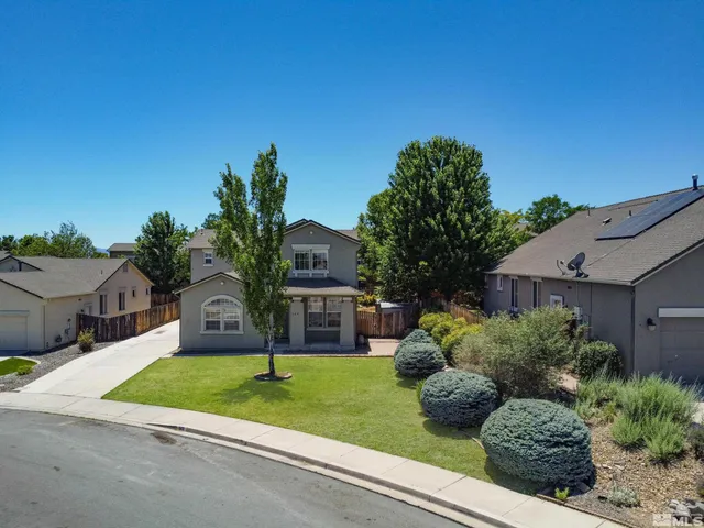 a house view with a outdoor space