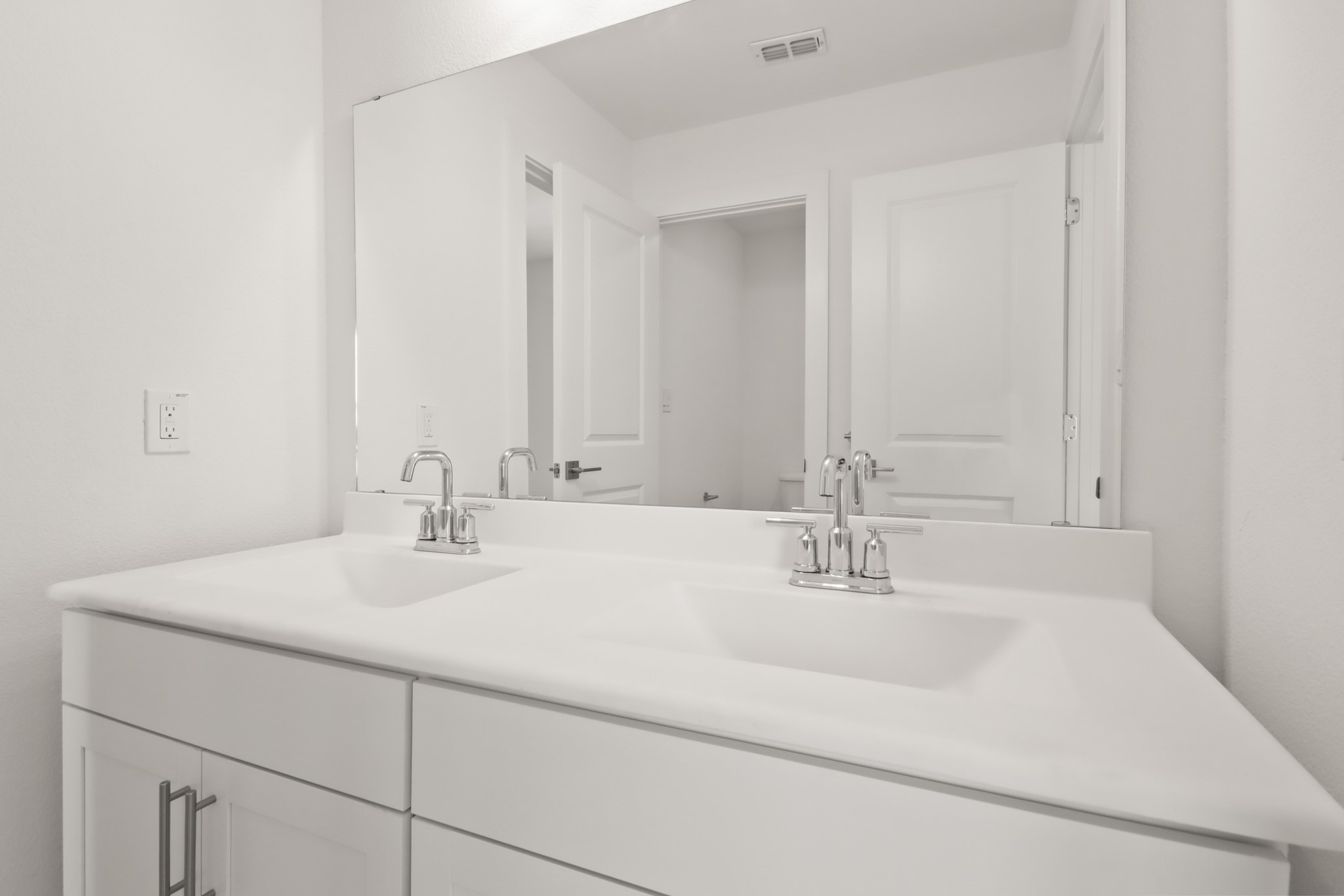 2810 Clapbread Lane Rosenberg, TX 77471 - Photo 13 of 39 a bathroom with double vanity sinks and a mirror