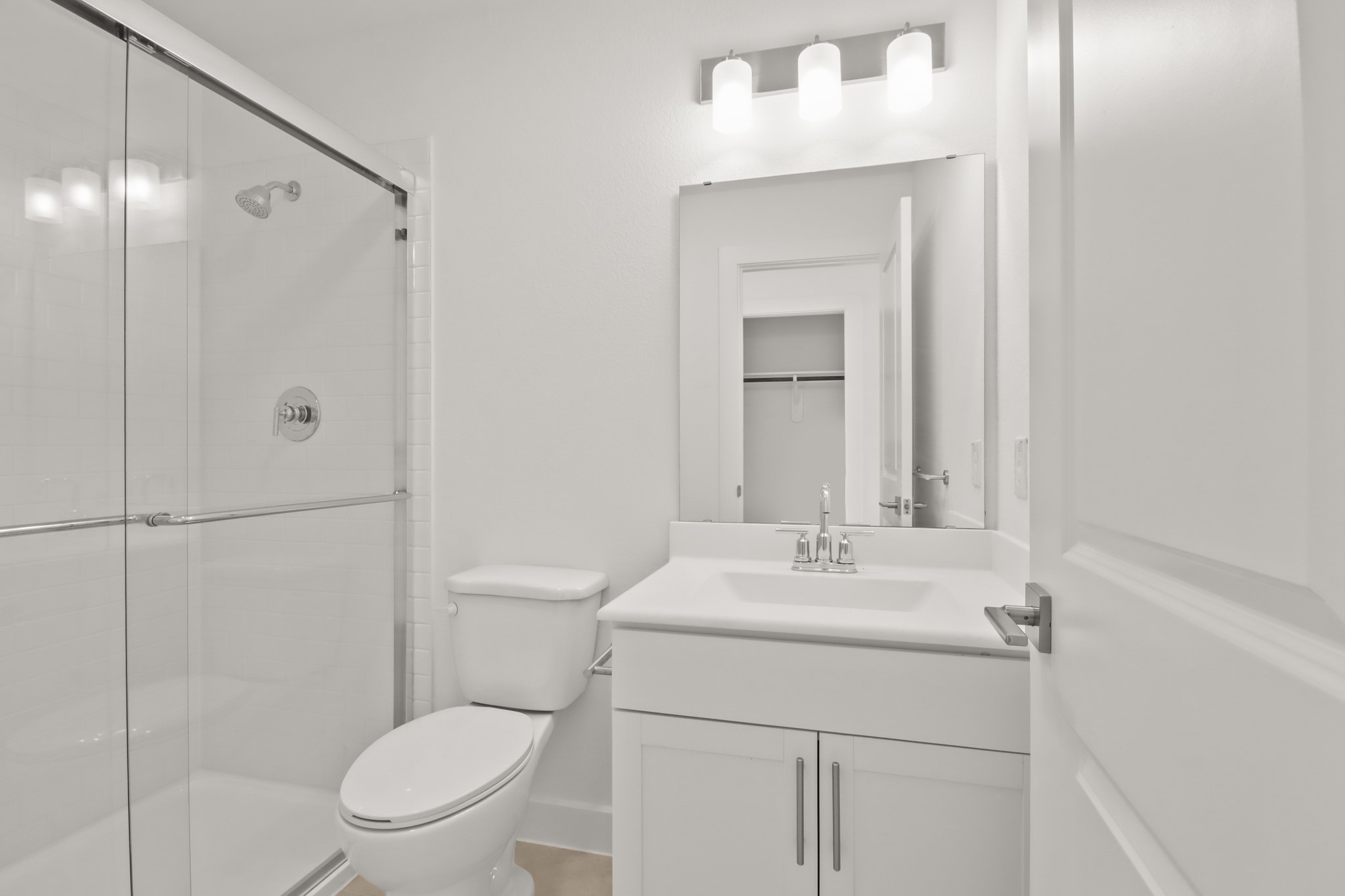 2810 Clapbread Lane Rosenberg, TX 77471 - Photo 16 of 39 a bathroom with a sink toilet vanity and shower