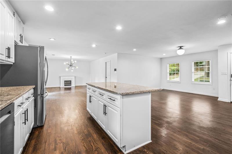 3089 Del Monico Drive Decatur, GA 30032 - Photo 14 of 47 a kitchen with stainless steel appliances granite countertop a stove and a refrigerator