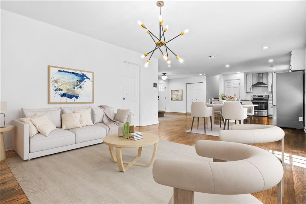 3089 Del Monico Drive Decatur, GA 30032 - Photo 20 of 47 a living room with furniture kitchen and a chandelier