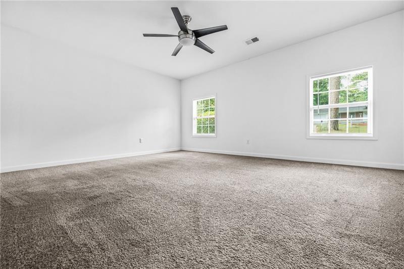3089 Del Monico Drive Decatur, GA 30032 - Photo 34 of 47 an empty room with windows and fan