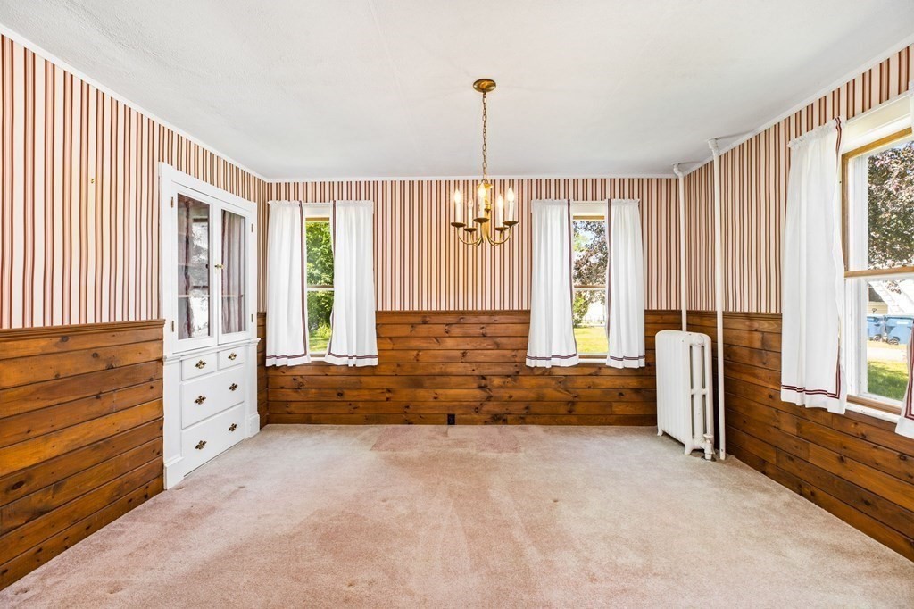 9 Messinger Street Canton, MA 02021 - Photo 12 of 31 a spacious bedroom with a bed and a window