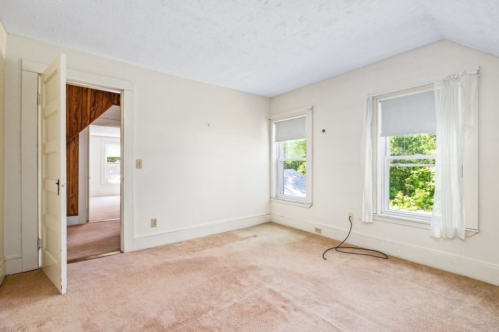 9 Messinger Street Canton, MA 02021 - Photo 20 of 31 an empty room with windows
