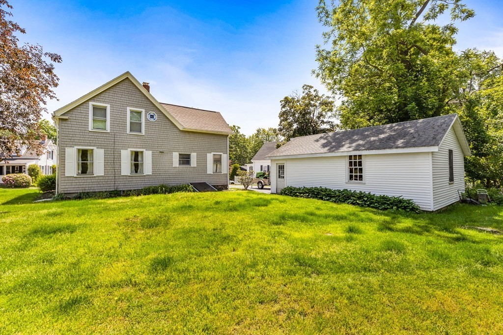 9 Messinger Street Canton, MA 02021 - Photo 28 of 31 a view of a house with a yard
