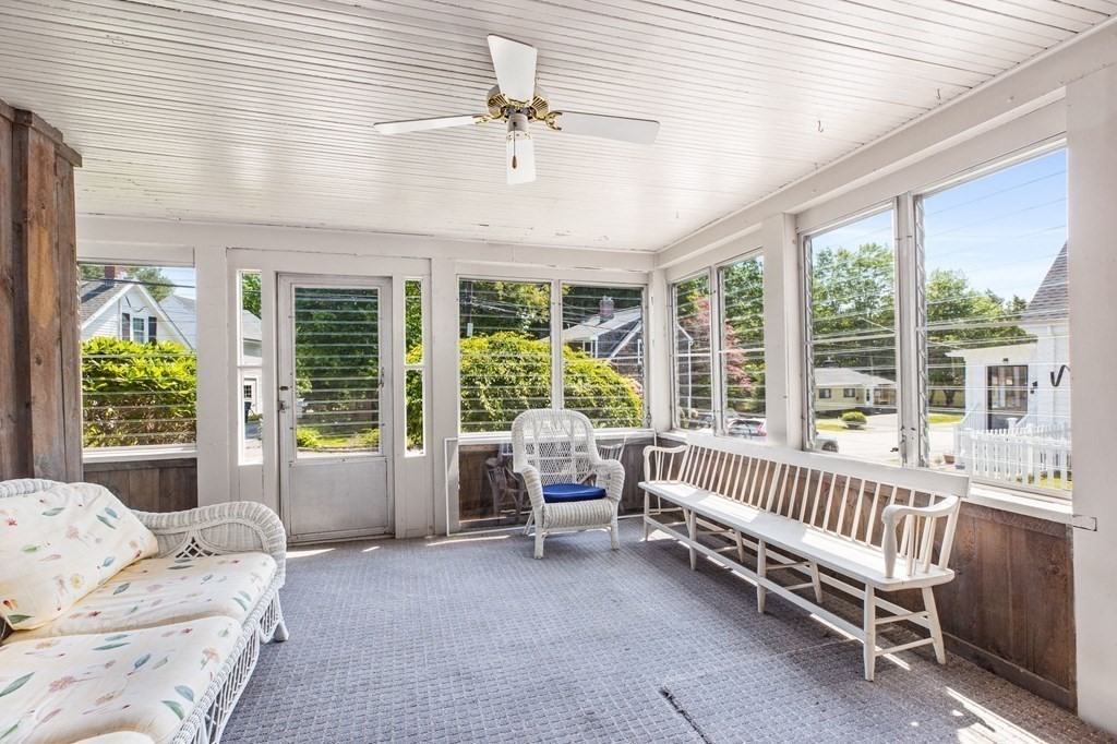 9 Messinger Street Canton, MA 02021 - Photo 9 of 31 a living room with furniture and a large window