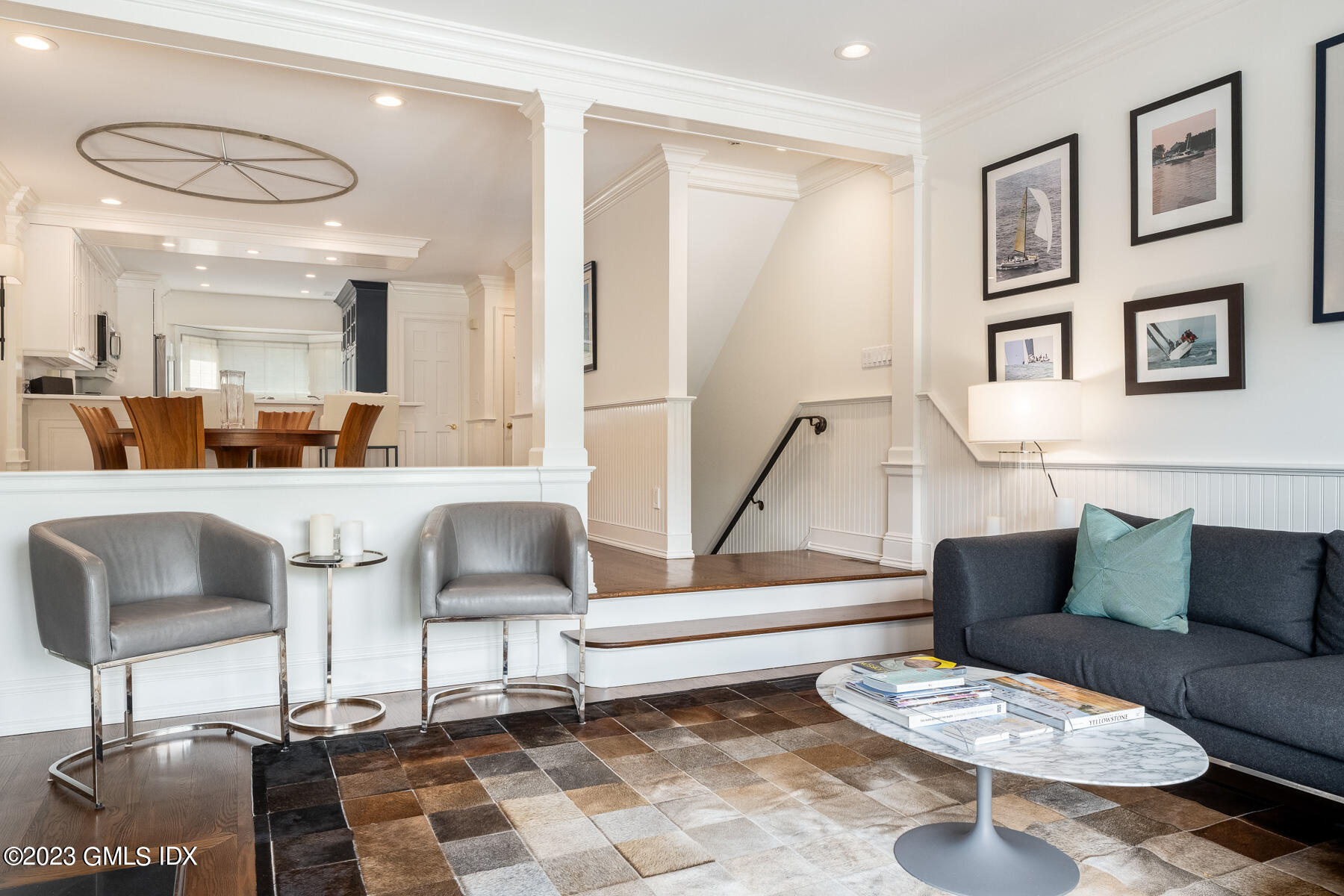 115 River Road, Unit 12 Cos Cob, CT 06807 - Photo 12 of 27 a living room with furniture and a rug