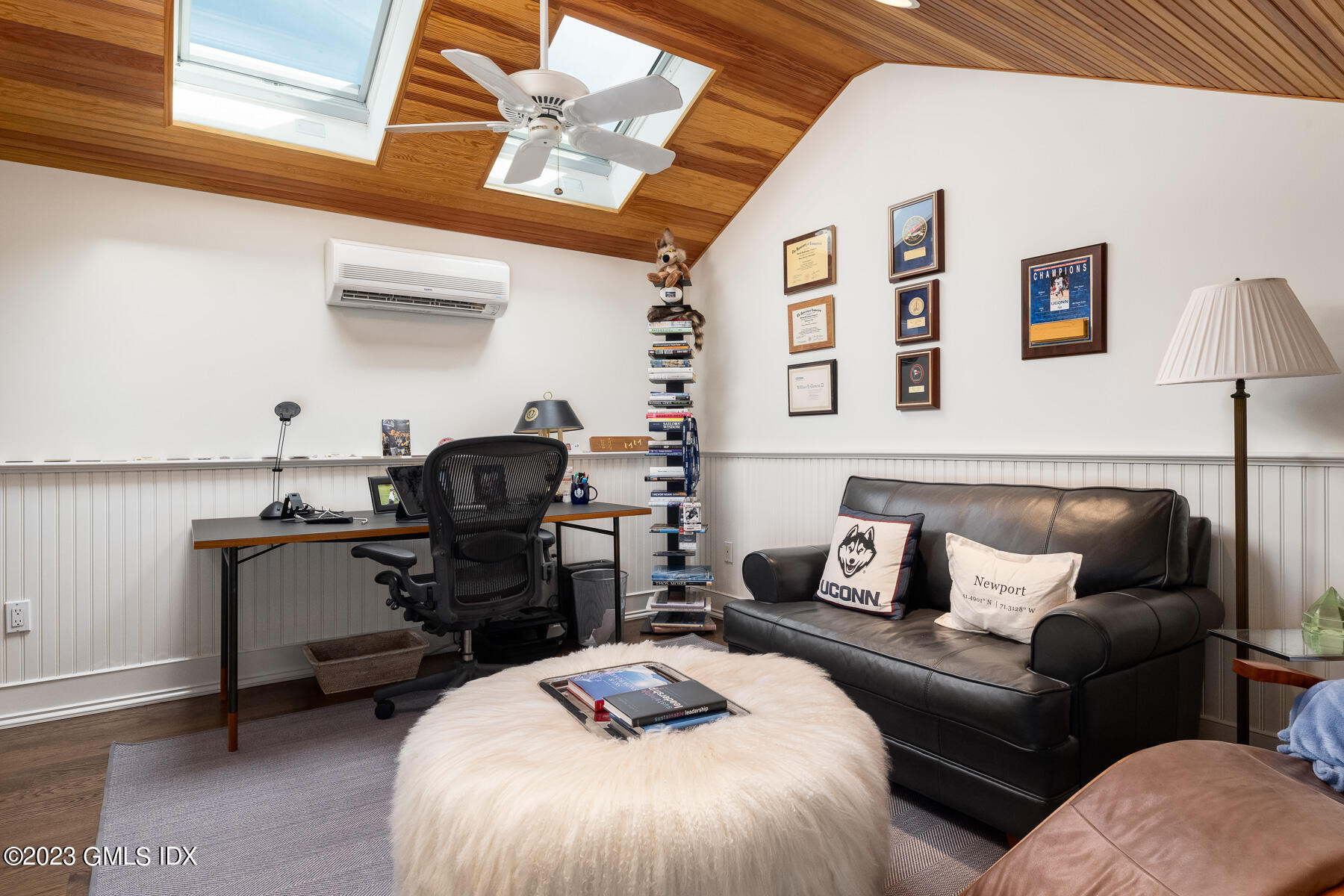 115 River Road, Unit 12 Cos Cob, CT 06807 - Photo 22 of 27 a living room with furniture and a piano
