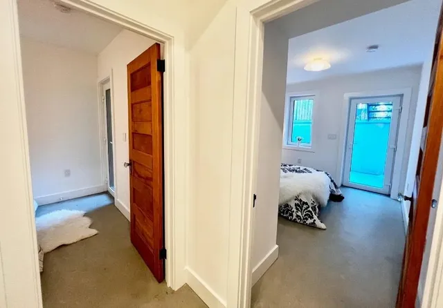 a bedroom with a bed and a closet