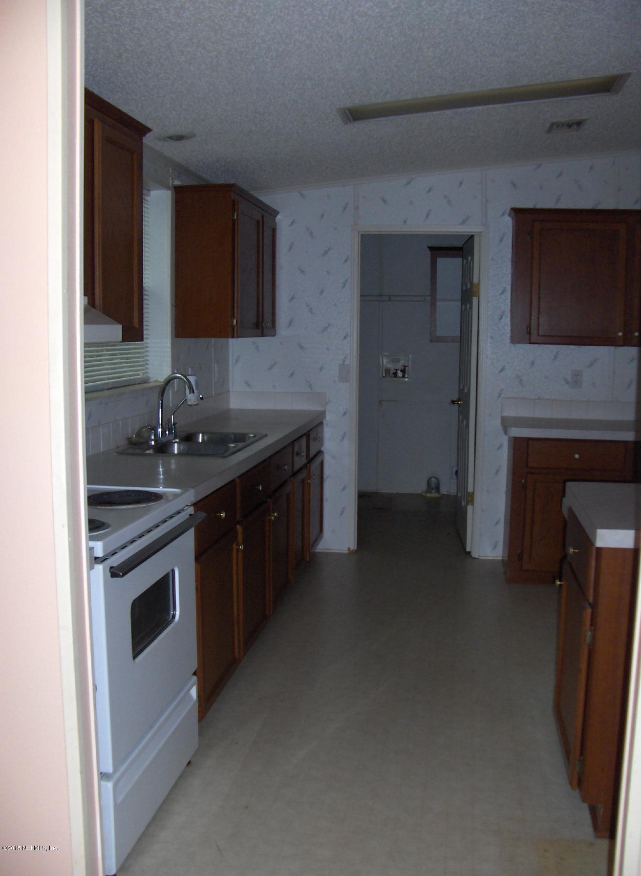 2668 Myrtle Loop Middleburg, FL 32068 - Photo 5 of 25 Kitchen off dining