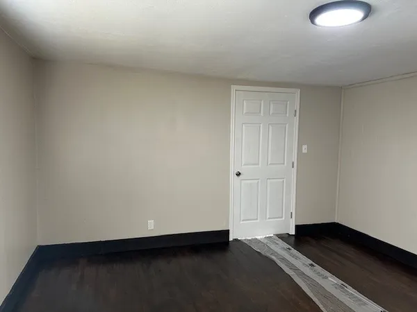 a stove top oven sitting inside of a kitchen