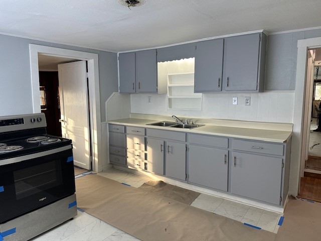 18943 Highway 7 Centerville, TX 75833 - Photo 25 of 33 a kitchen with a stove sink and cabinets