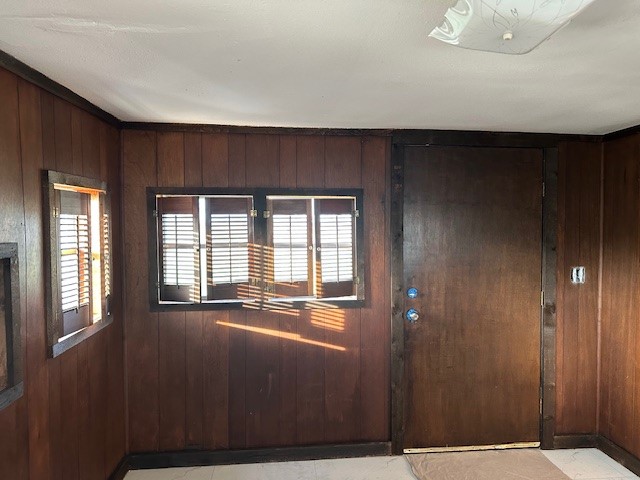 18943 Highway 7 Centerville, TX 75833 - Photo 29 of 33 a view of an empty room with wooden floor and a window