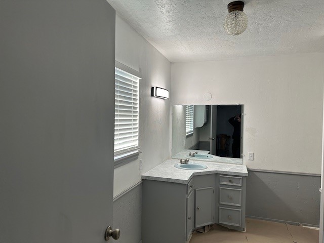 18943 Highway 7 Centerville, TX 75833 - Photo 31 of 33 a bathroom with a sink and a mirror
