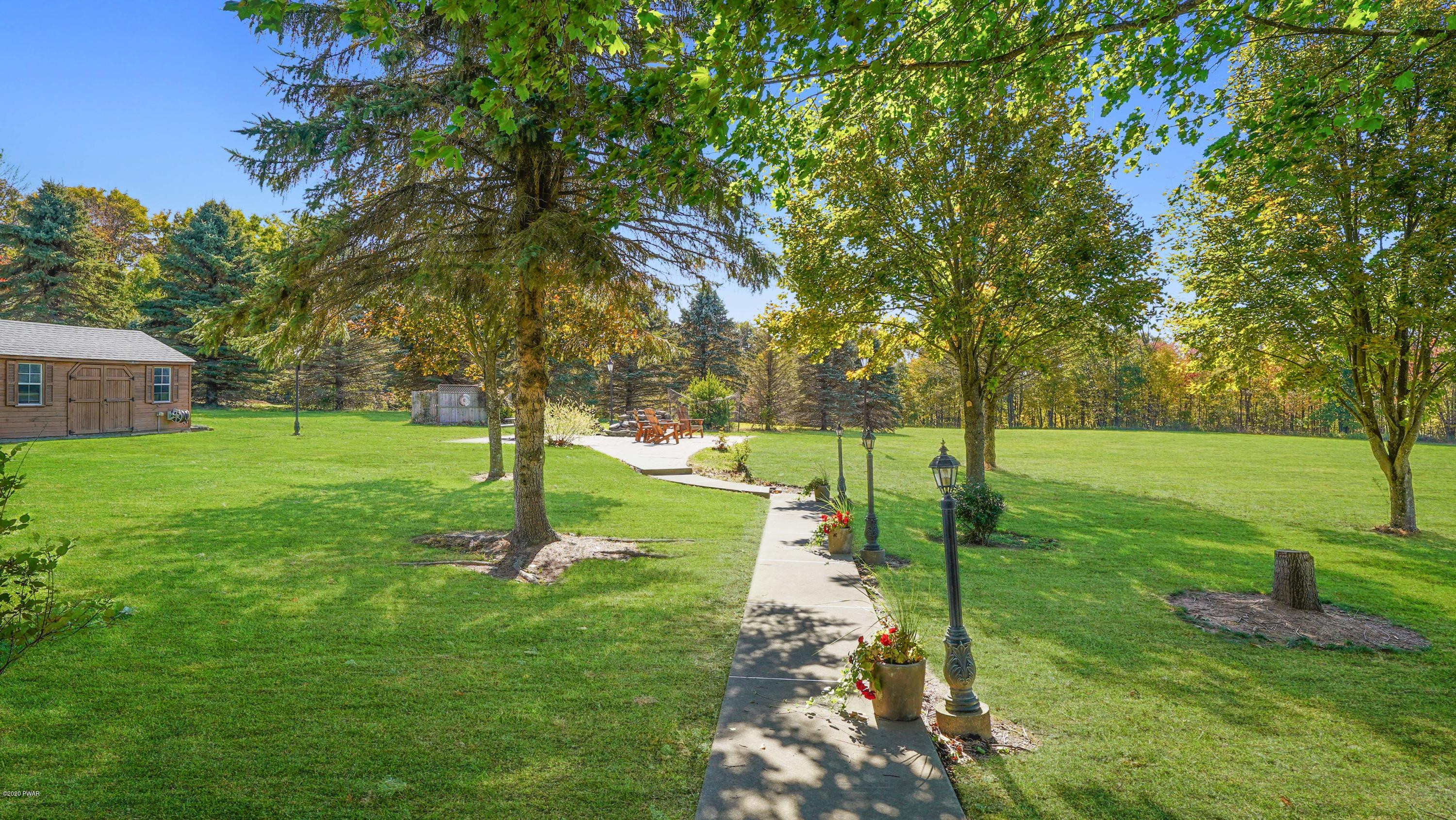 161 J J Road Moscow, PA 18444 - Photo 27 of 73 a view of a park with large trees