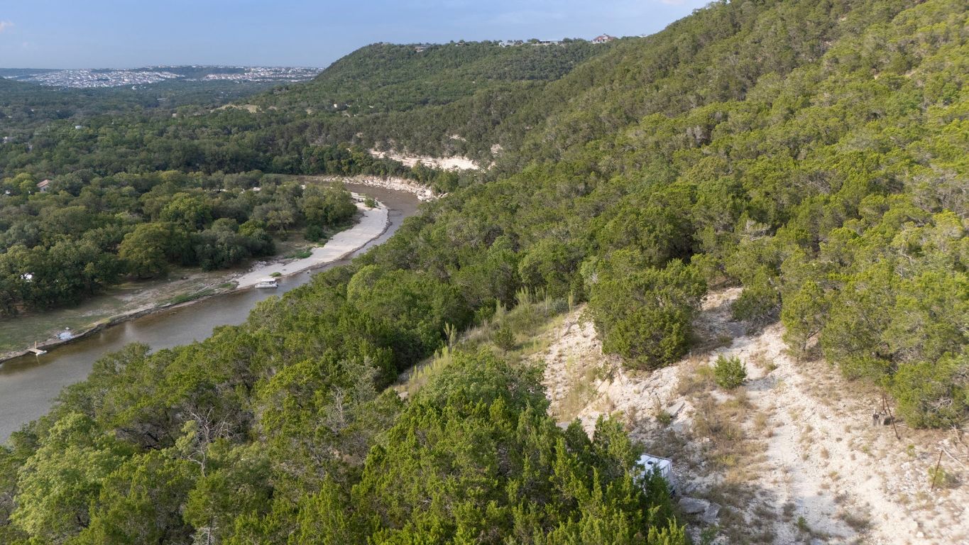 Tbd Johnson Road Leander, TX 78641 - Photo 23 of 31 a view of a forest with a lush green hillside