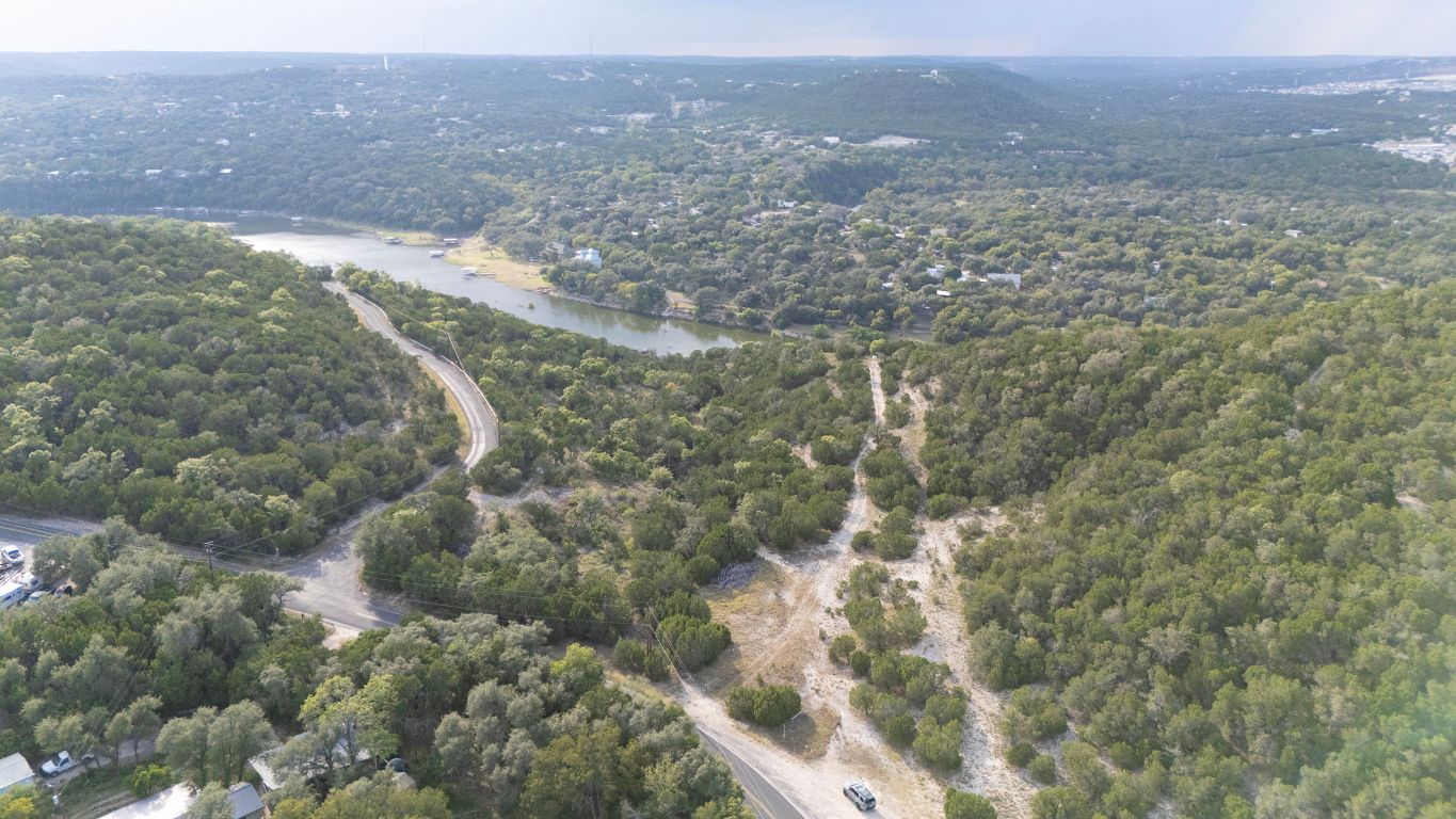 Tbd Johnson Road Leander, TX 78641 - Photo 4 of 31 a view of a field with an trees in the background