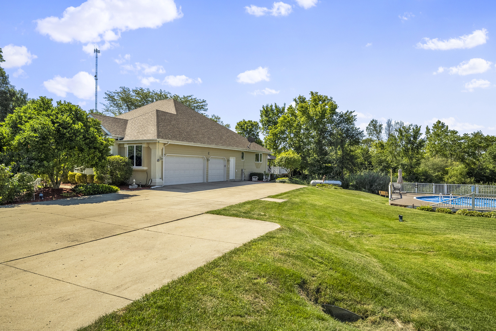 2801 East 2525th Road Marseilles, IL 61341 - Photo 3 of 44 a house with swimming pool in front of it