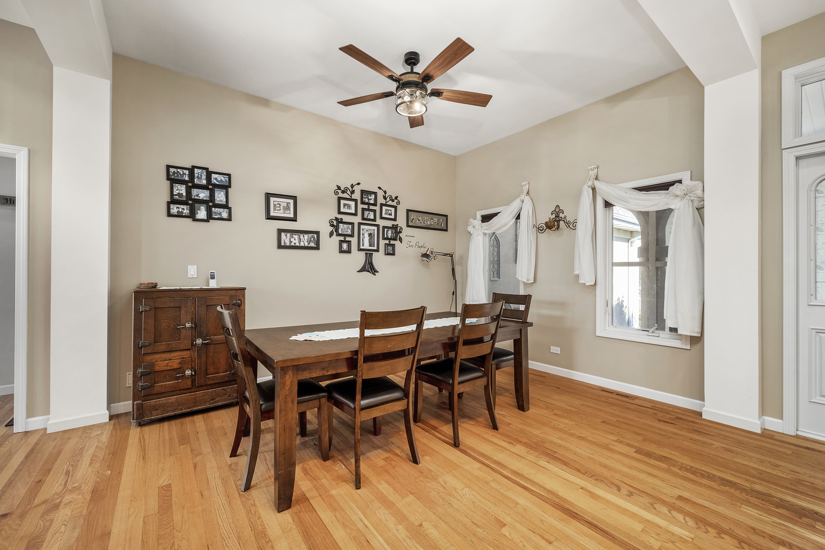 2801 East 2525th Road Marseilles, IL 61341 - Photo 8 of 44 a view of a dining room with furniture and wooden floor