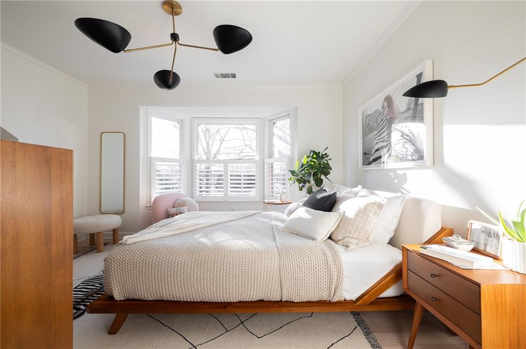 237 Sycamore Place Decatur, GA 30030 - Photo 35 of 52 a bedroom with a bed and a window