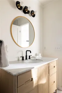 a bedroom with furniture and window