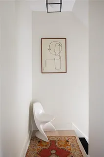 a living room with furniture and window