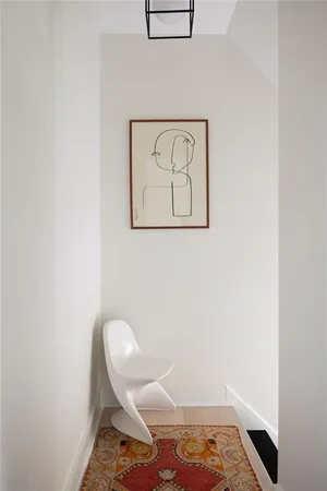 a living room with furniture and window