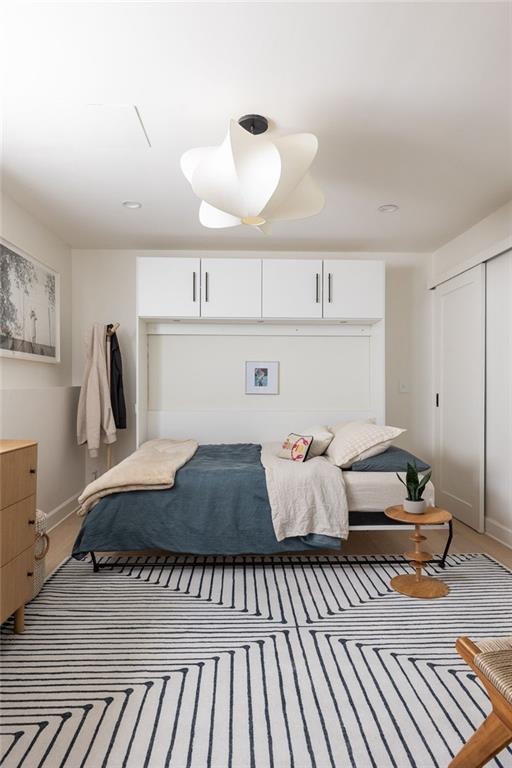 237 Sycamore Place Decatur, GA 30030 - Photo 41 of 52 a bedroom with bed and window
