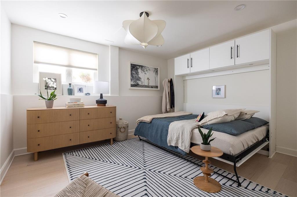 237 Sycamore Place Decatur, GA 30030 - Photo 42 of 52 a bedroom with furniture and window