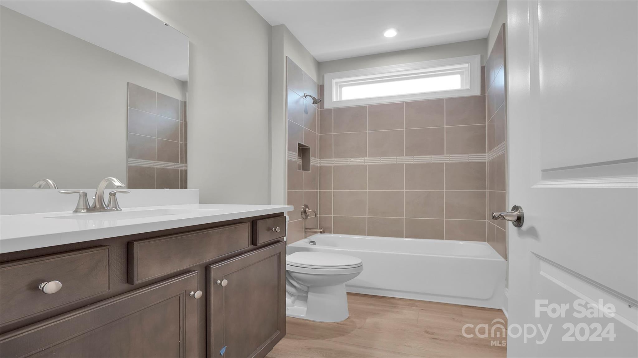 3053 Trace Meadow York, SC 29745 - Photo 13 of 28 a bathroom with a sink a toilet and shower