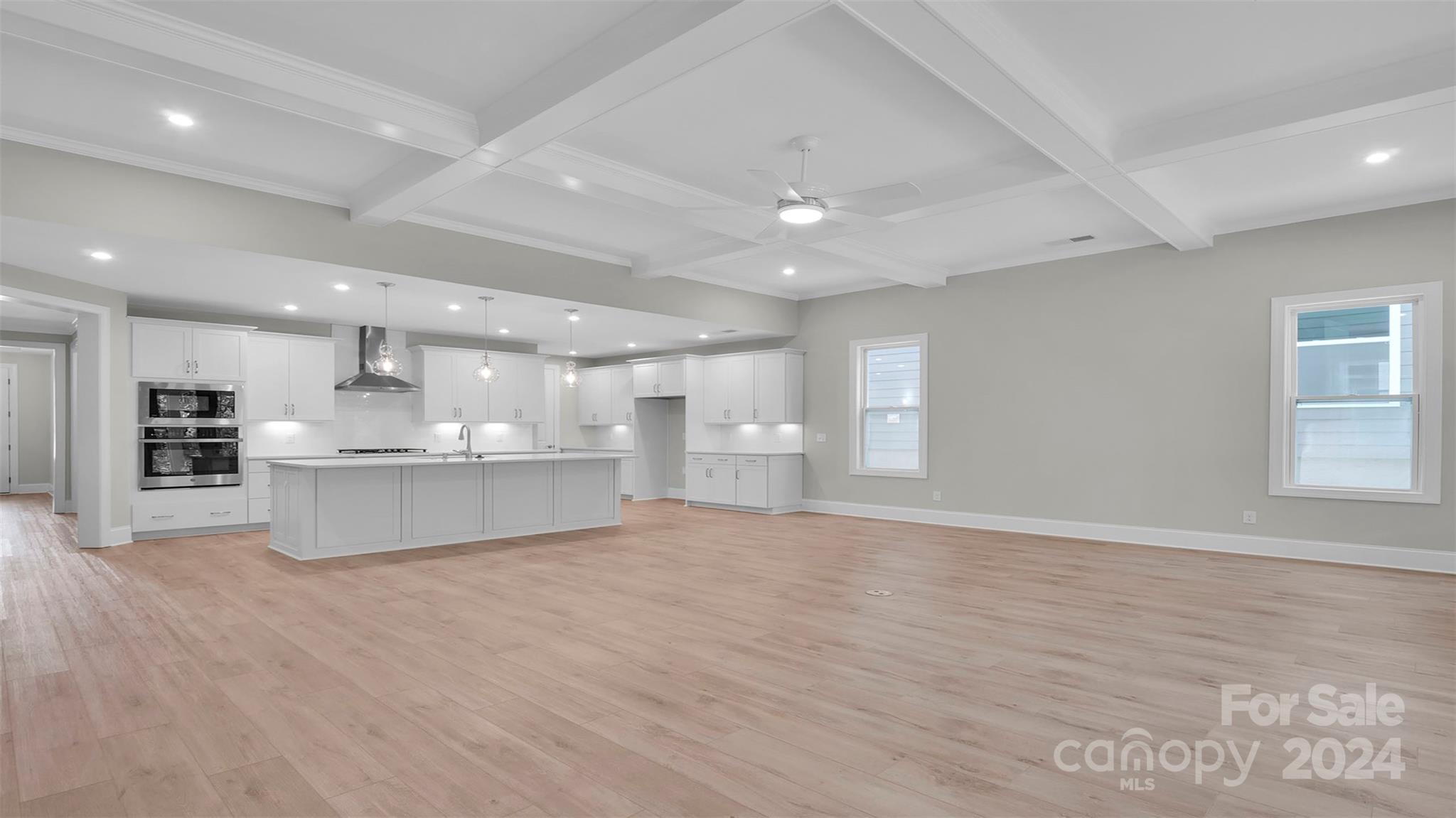 3053 Trace Meadow York, SC 29745 - Photo 19 of 28 a view of kitchen and kitchen with large windows