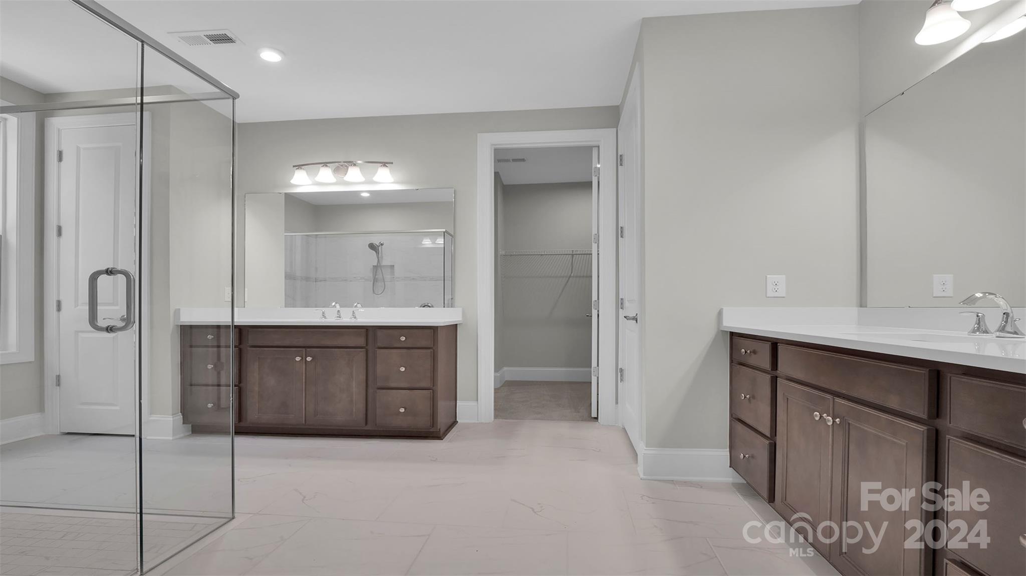 3053 Trace Meadow York, SC 29745 - Photo 8 of 28 a spacious bathroom with a granite countertop sink mirror and shower