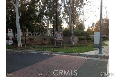20702 El Toro Road, Unit 98 Lake Forest, CA 92630 - Photo 1 of 1 a backyard of a house with lots of green space