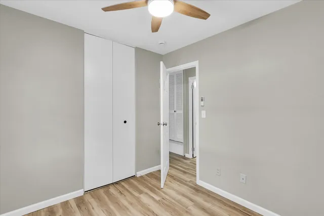 a view of a livingroom with wooden floor