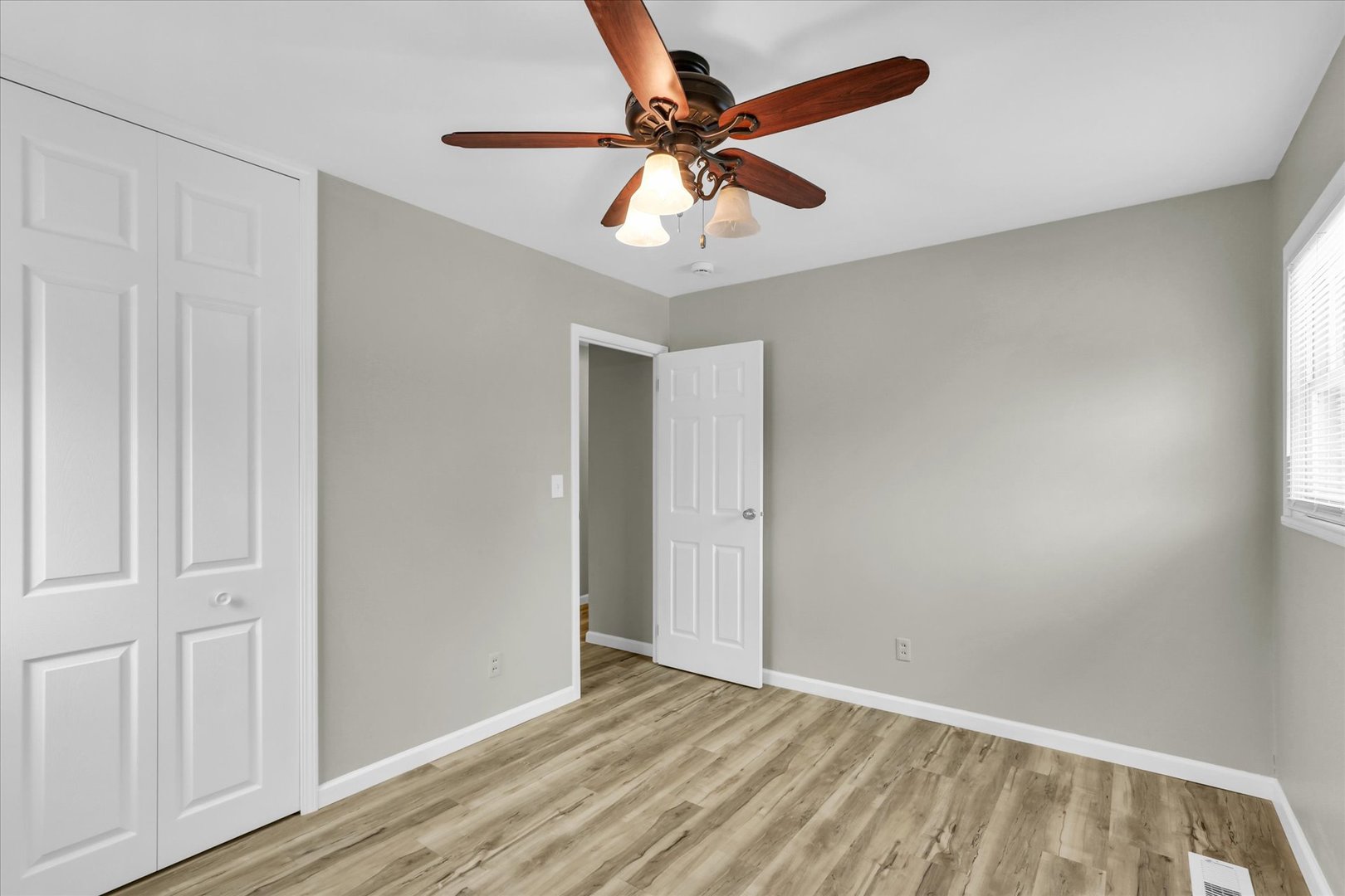 2808 Carrelton Drive Champaign, IL 61821 - Photo 19 of 24 wooden floor in an empty room