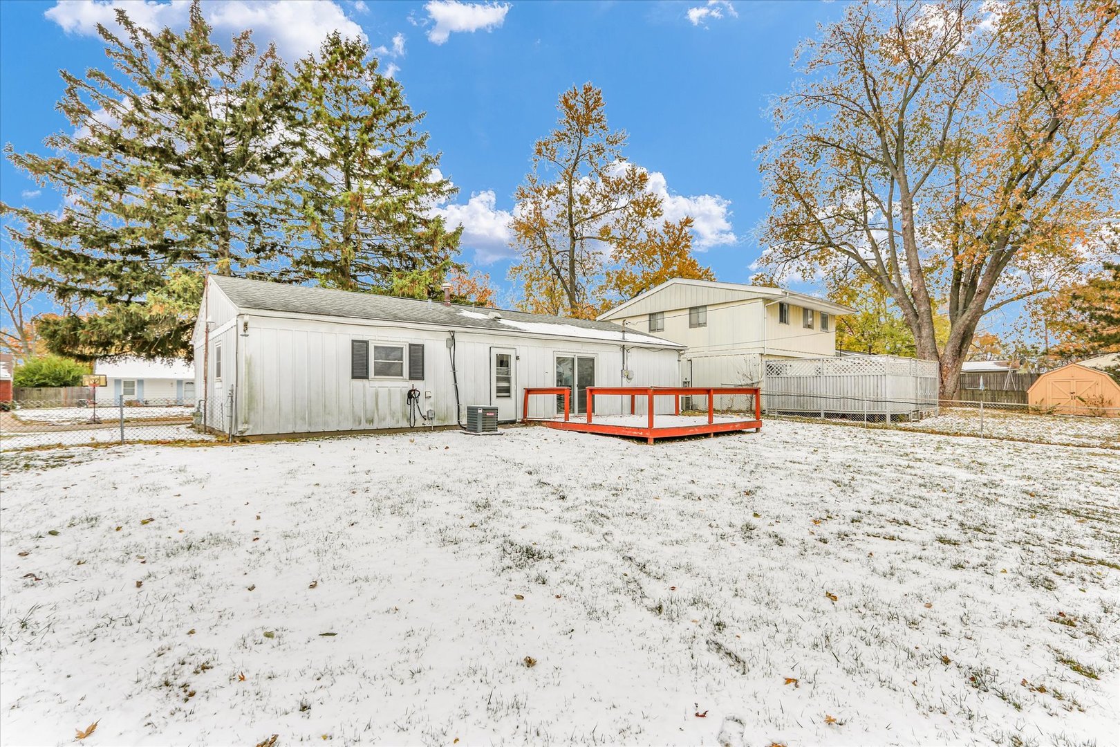2808 Carrelton Drive Champaign, IL 61821 - Photo 21 of 24 a view of a house with a yard and large tree