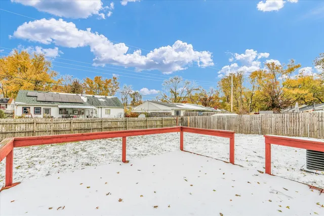 a view of an swimming pool with an outdoor seating