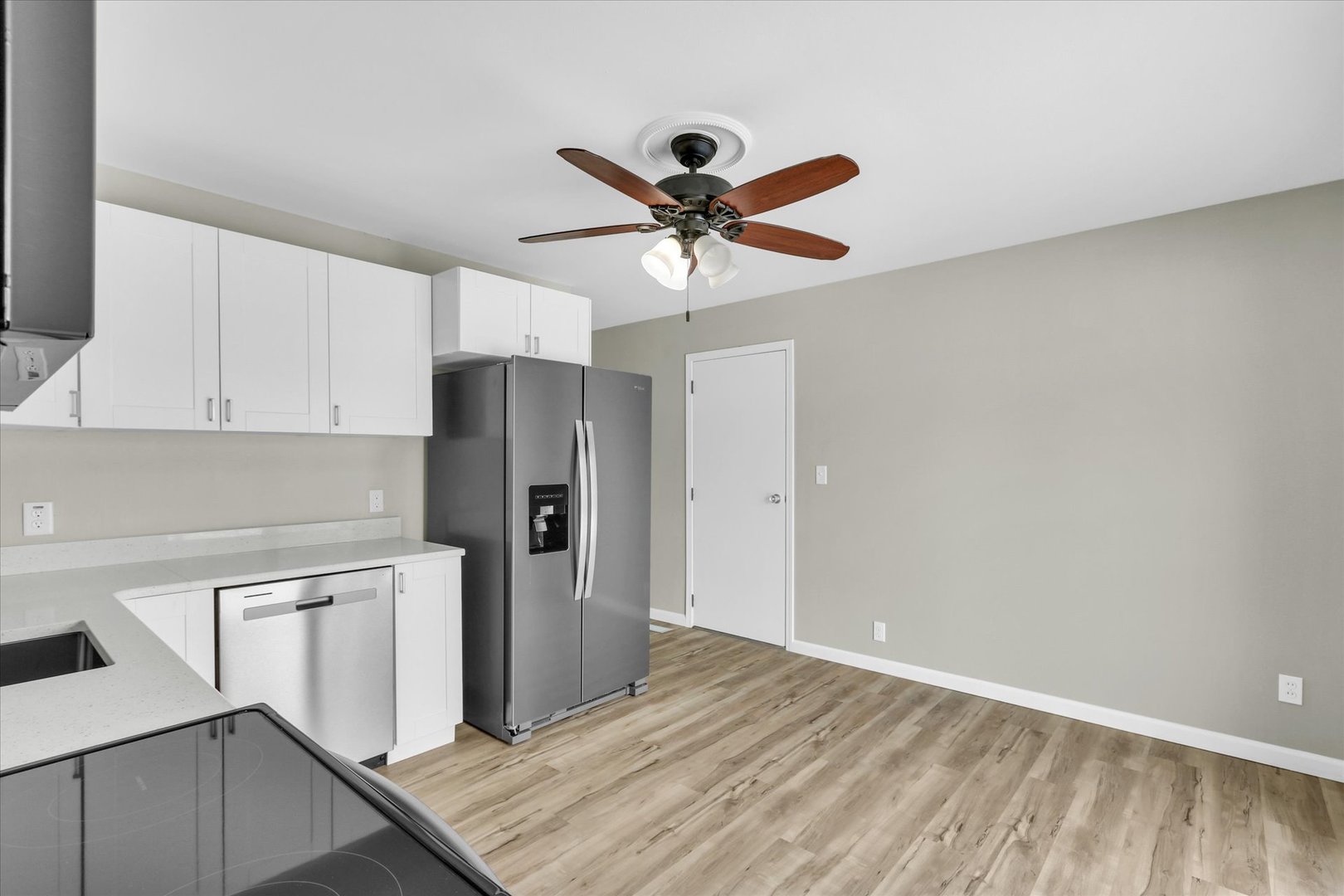 2808 Carrelton Drive Champaign, IL 61821 - Photo 10 of 24 a view of a kitchen with a sink and cabinets