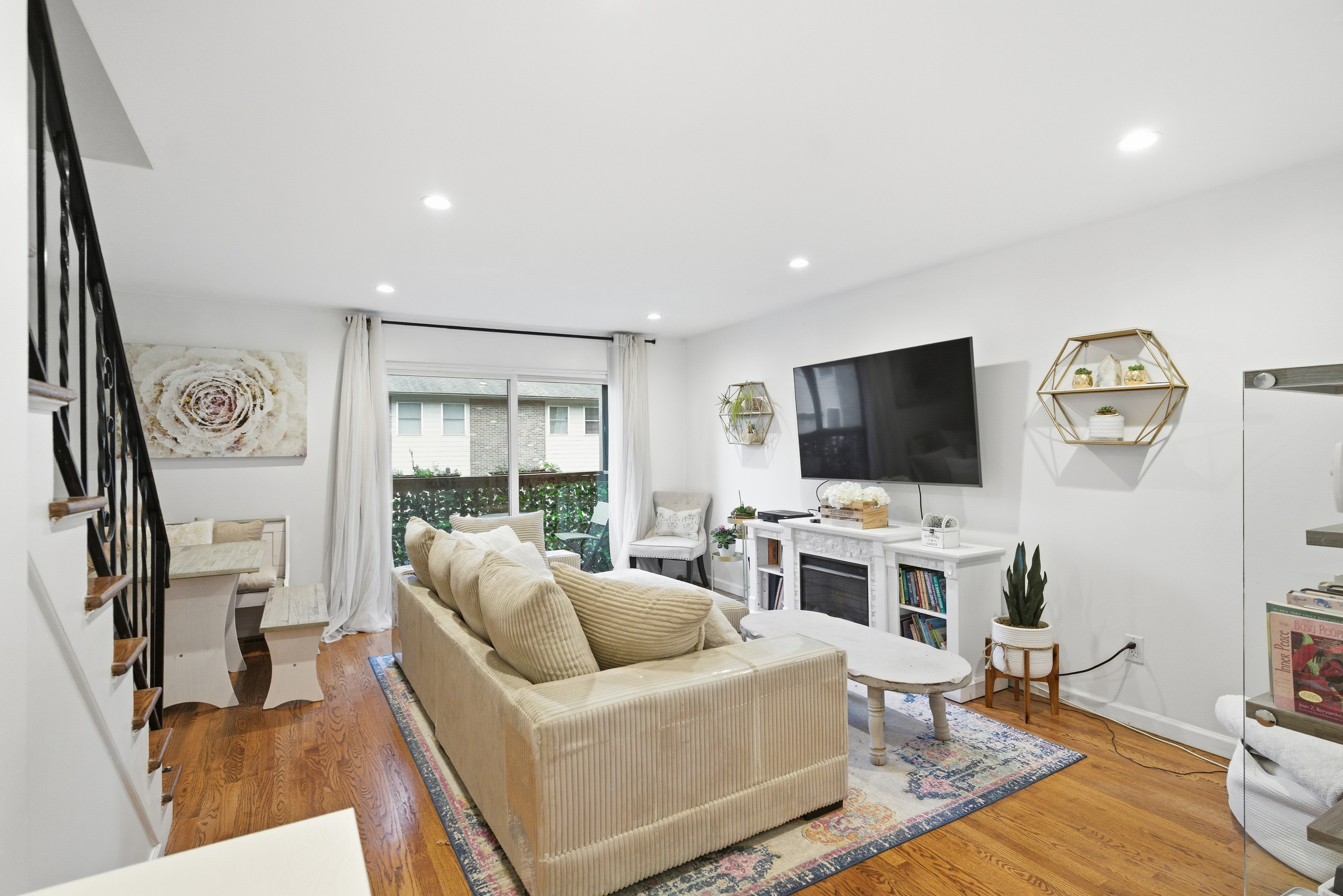 382 Knapps Highway, Unit 382 Fairfield, CT 06825 - Photo 1 of 22 a living room with furniture and a flat screen tv