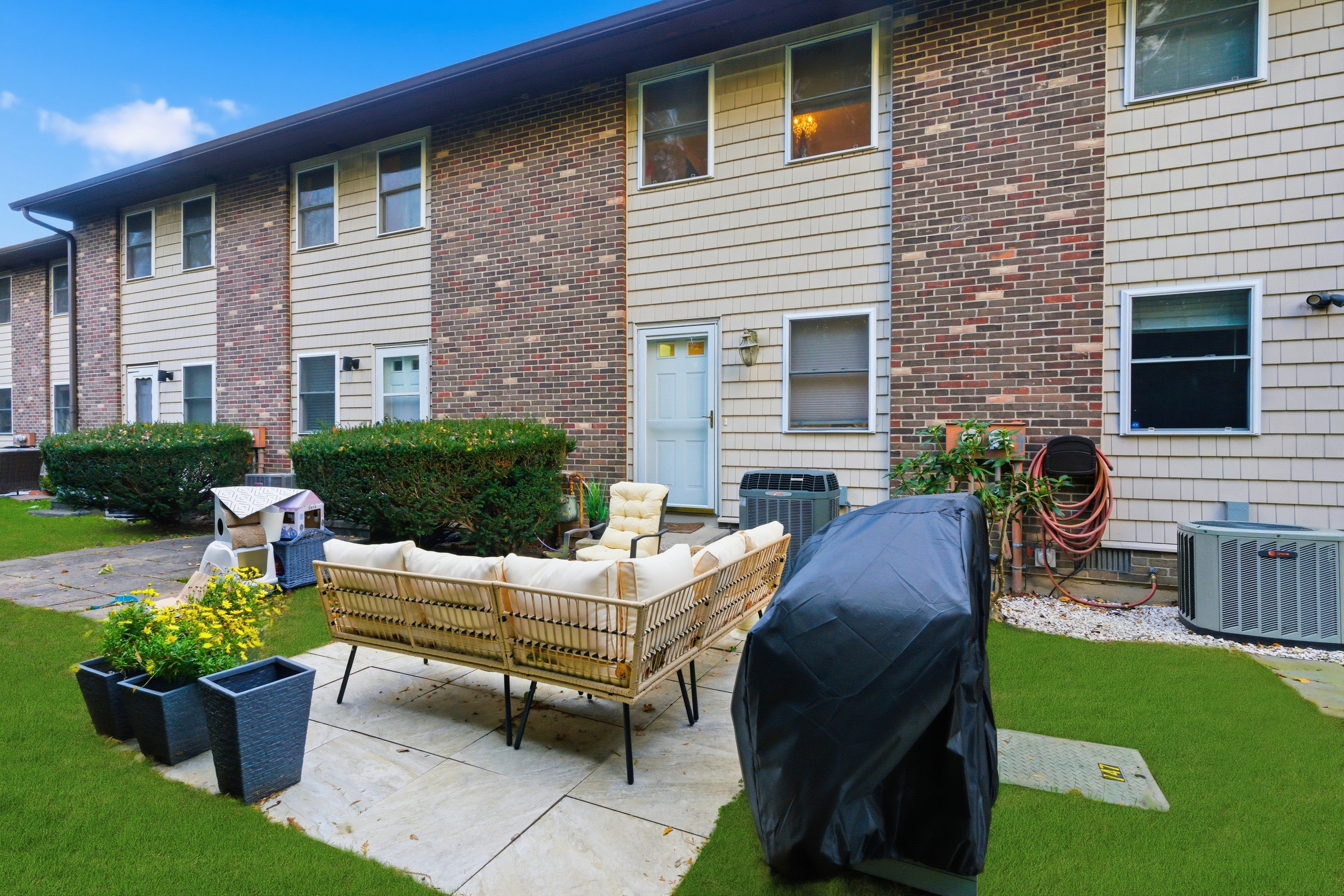 382 Knapps Highway, Unit 382 Fairfield, CT 06825 - Photo 16 of 22 a view of a house with patio