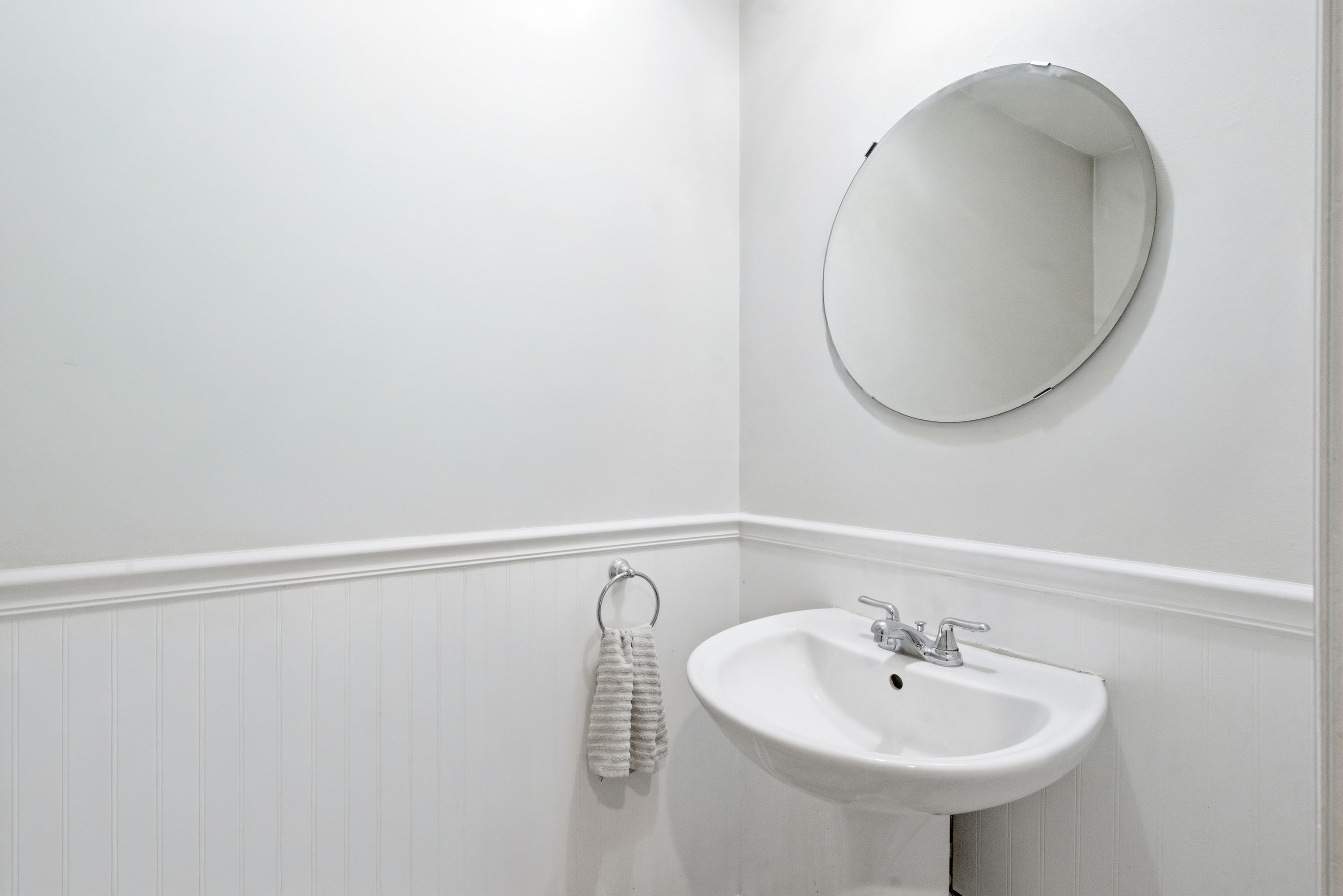 382 Knapps Highway, Unit 382 Fairfield, CT 06825 - Photo 7 of 22 a bathroom with a sink and a mirror