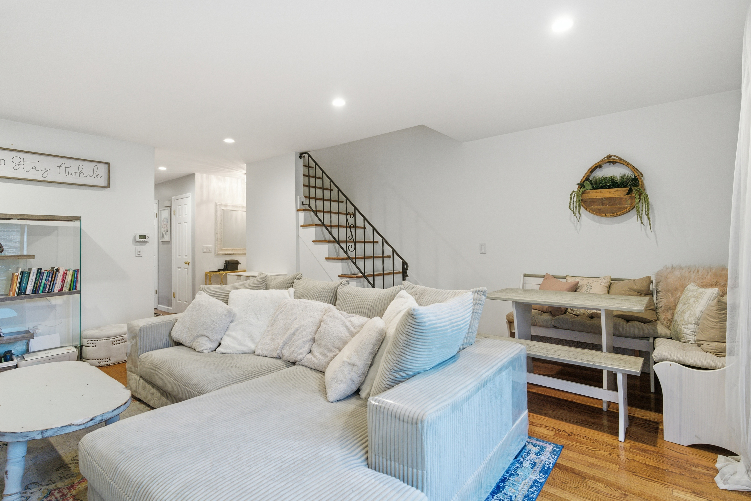 382 Knapps Highway, Unit 382 Fairfield, CT 06825 - Photo 9 of 22 a living room with furniture and a wooden floor