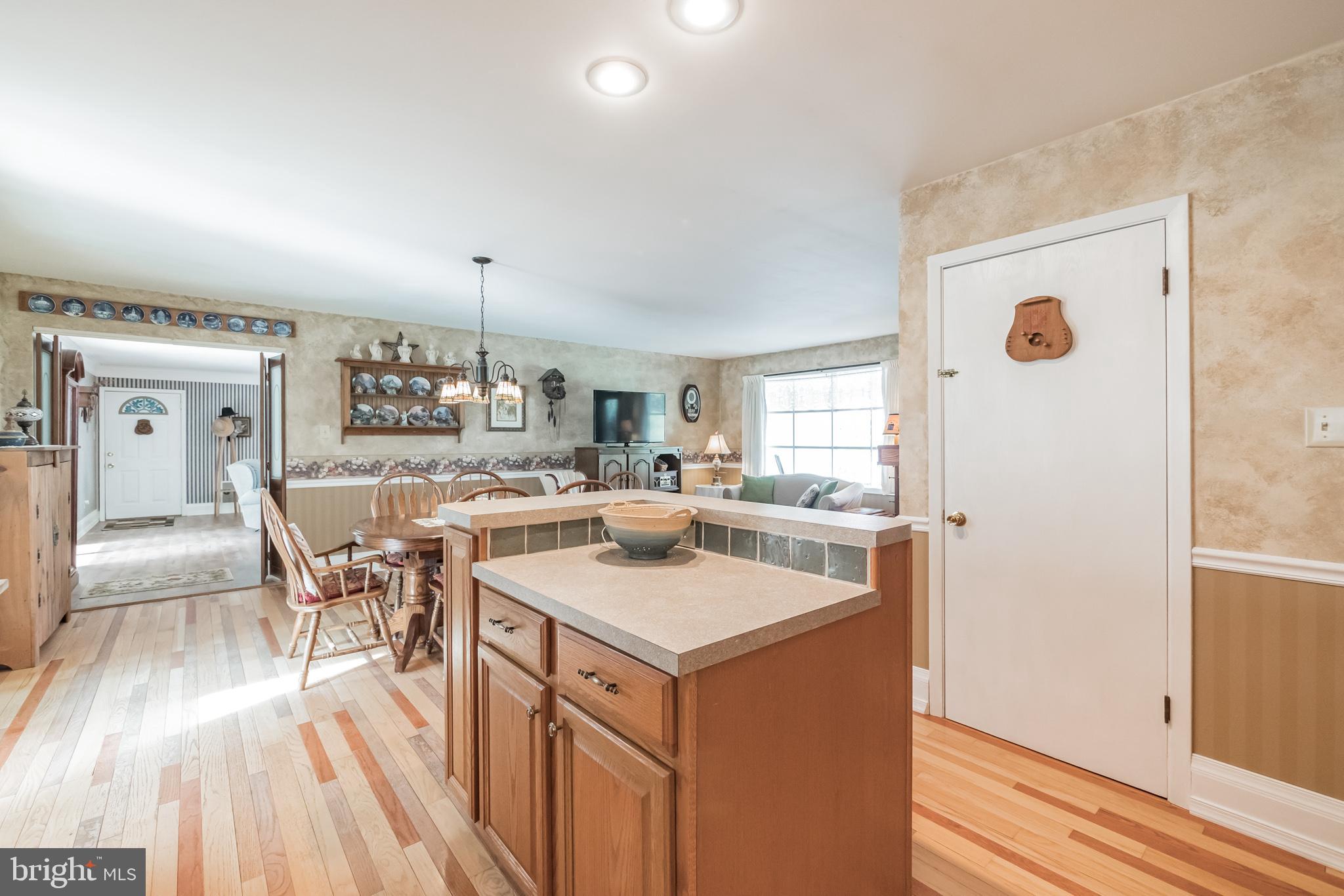 410 Lockhouse Road Falling Waters, WV 25419 - Photo 8 of 30 Kitchen View to Dining Area and Side Door Addition