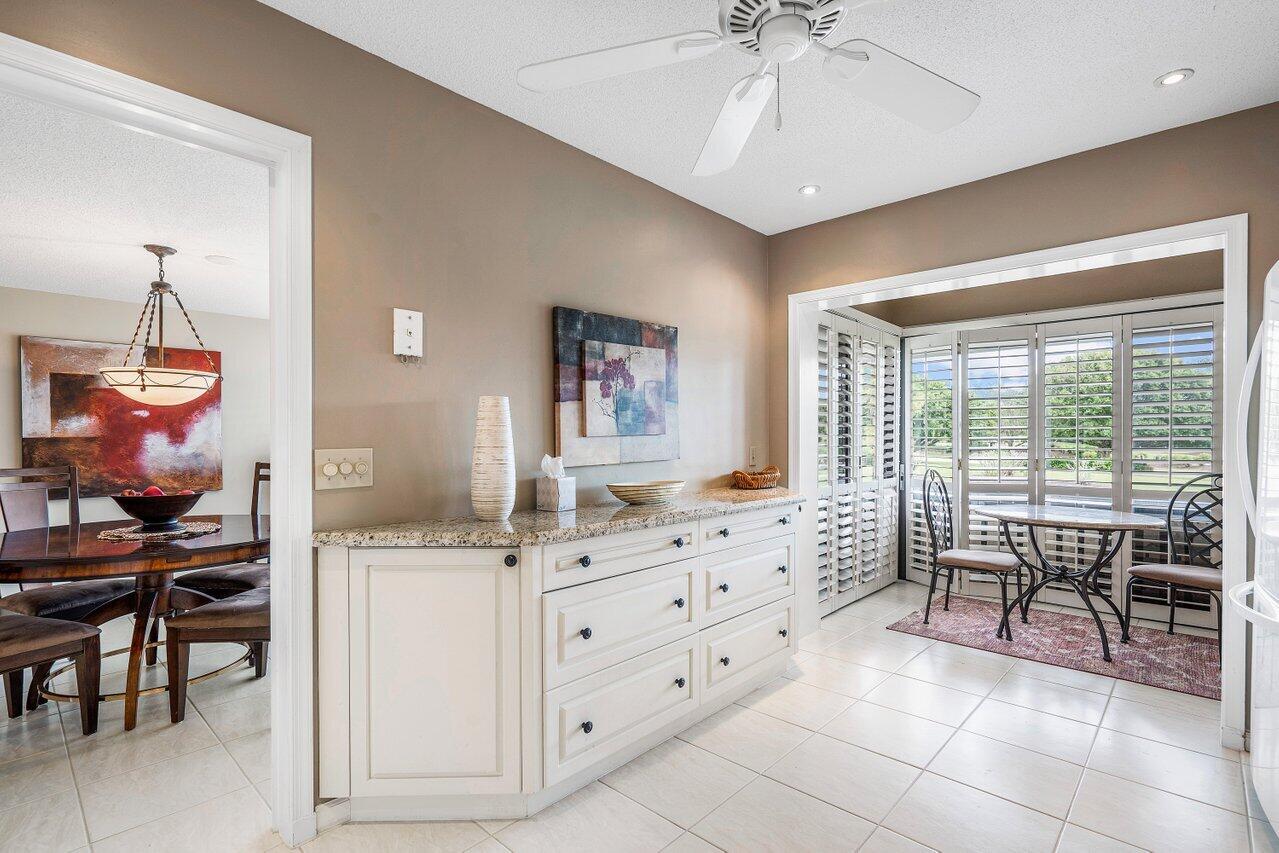 10185 Quail Covey Road, Unit HIBISCUS N Boynton Beach, FL 33436 - Photo 9 of 26 Kitchen
