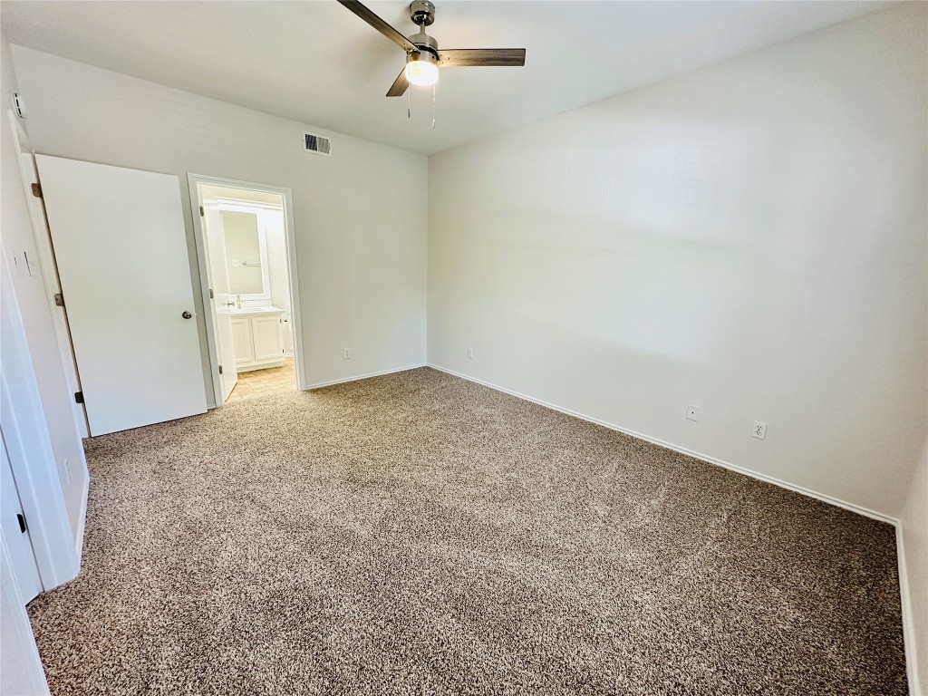 4711 Spicewood Springs Road, Unit 3118 Austin, TX 78759 - Photo 14 of 25 an empty room with a natural light