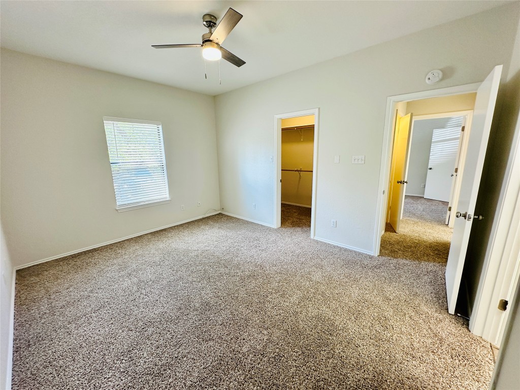 4711 Spicewood Springs Road, Unit 3118 Austin, TX 78759 - Photo 16 of 25 an empty room with windows and entrance