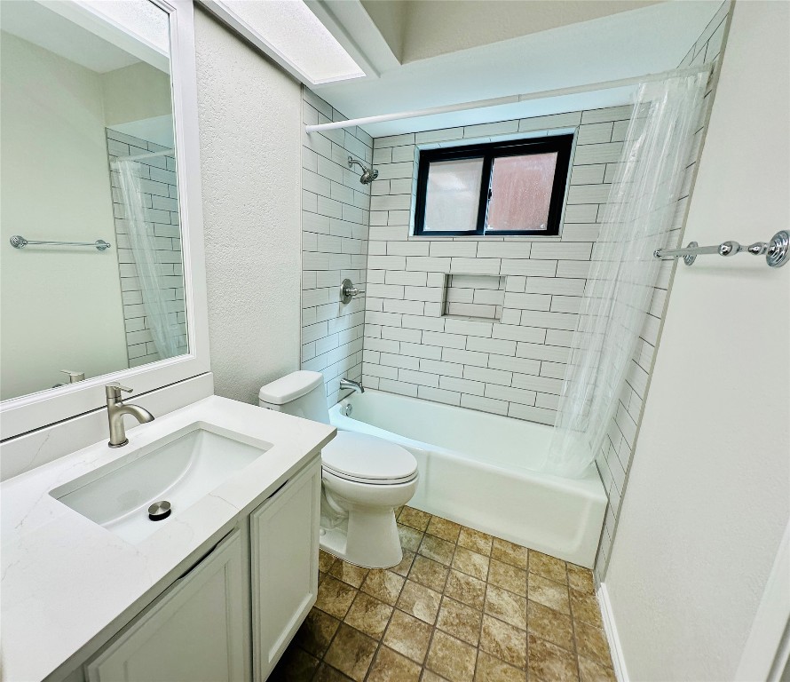 4711 Spicewood Springs Road, Unit 3118 Austin, TX 78759 - Photo 18 of 25 a bathroom with a sink a toilet and shower
