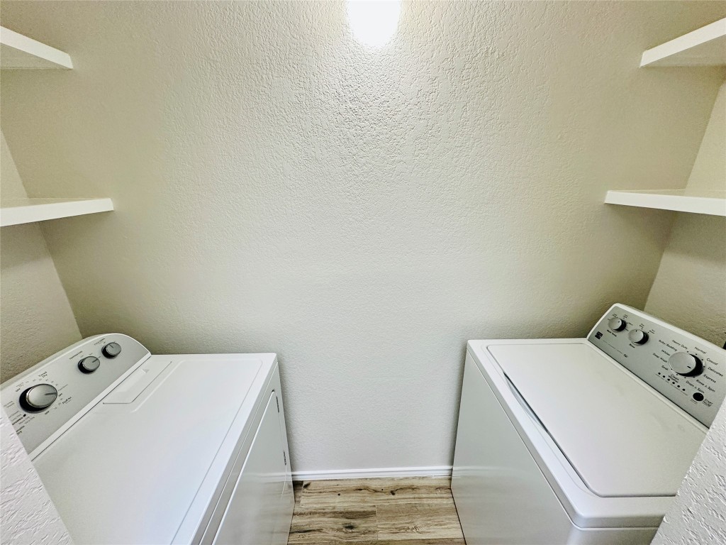 4711 Spicewood Springs Road, Unit 3118 Austin, TX 78759 - Photo 10 of 25 a utility room with dryer and washer